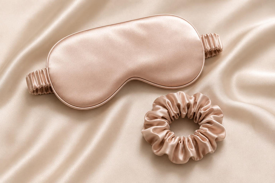 Matching silk sleep mask and scrunchie on silk fabric